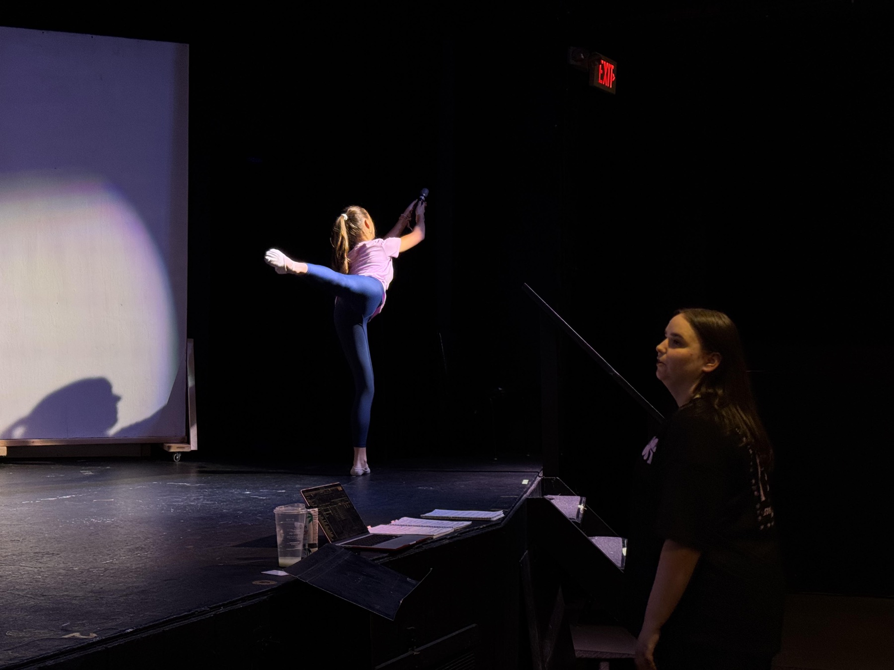 Charity Schueckler performs a ballet sequence during rehearsal for Once Upon a December